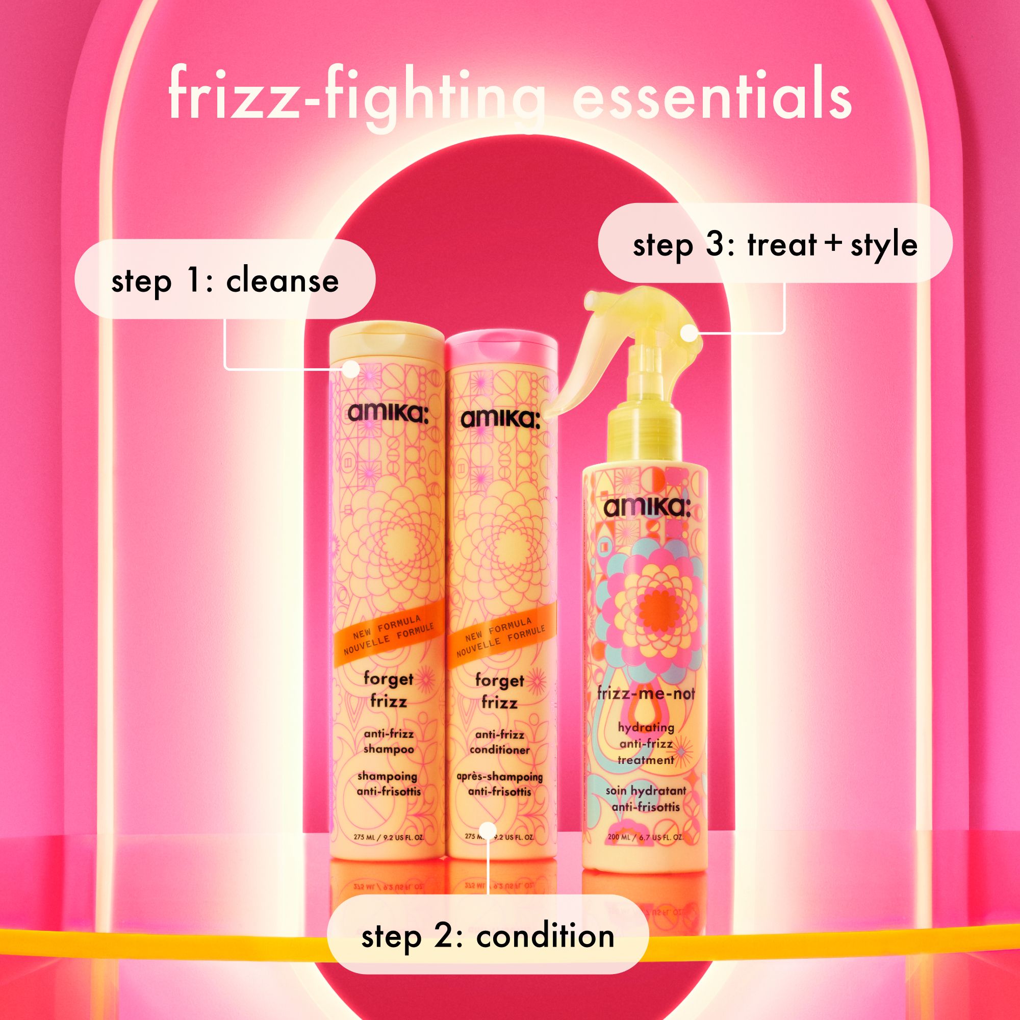Amika hair care products with step-by-step instructions on a pink background