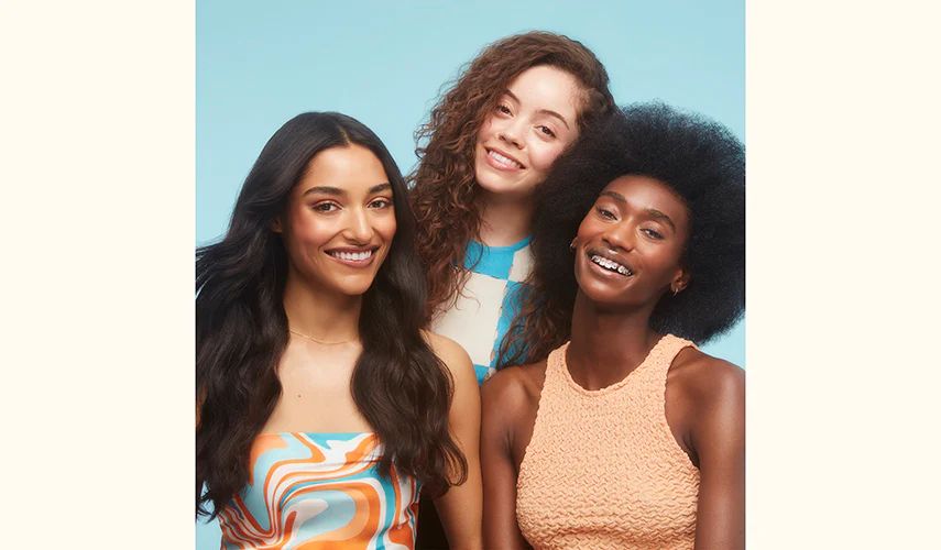 3 models posing together