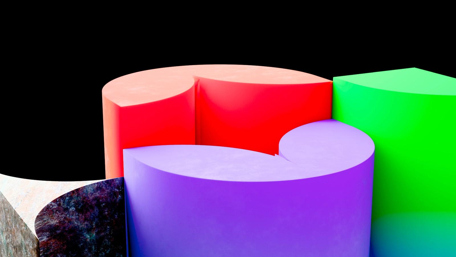 Red, green and purple cylindrical forms turning against black.