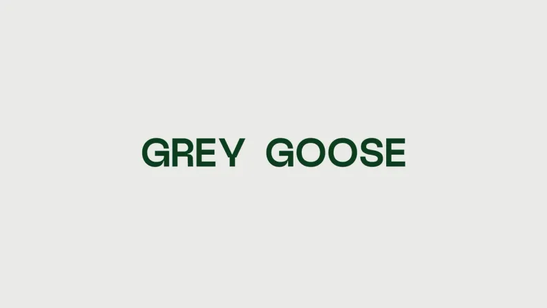 The Grey Goose wordmark in forest green on pearl