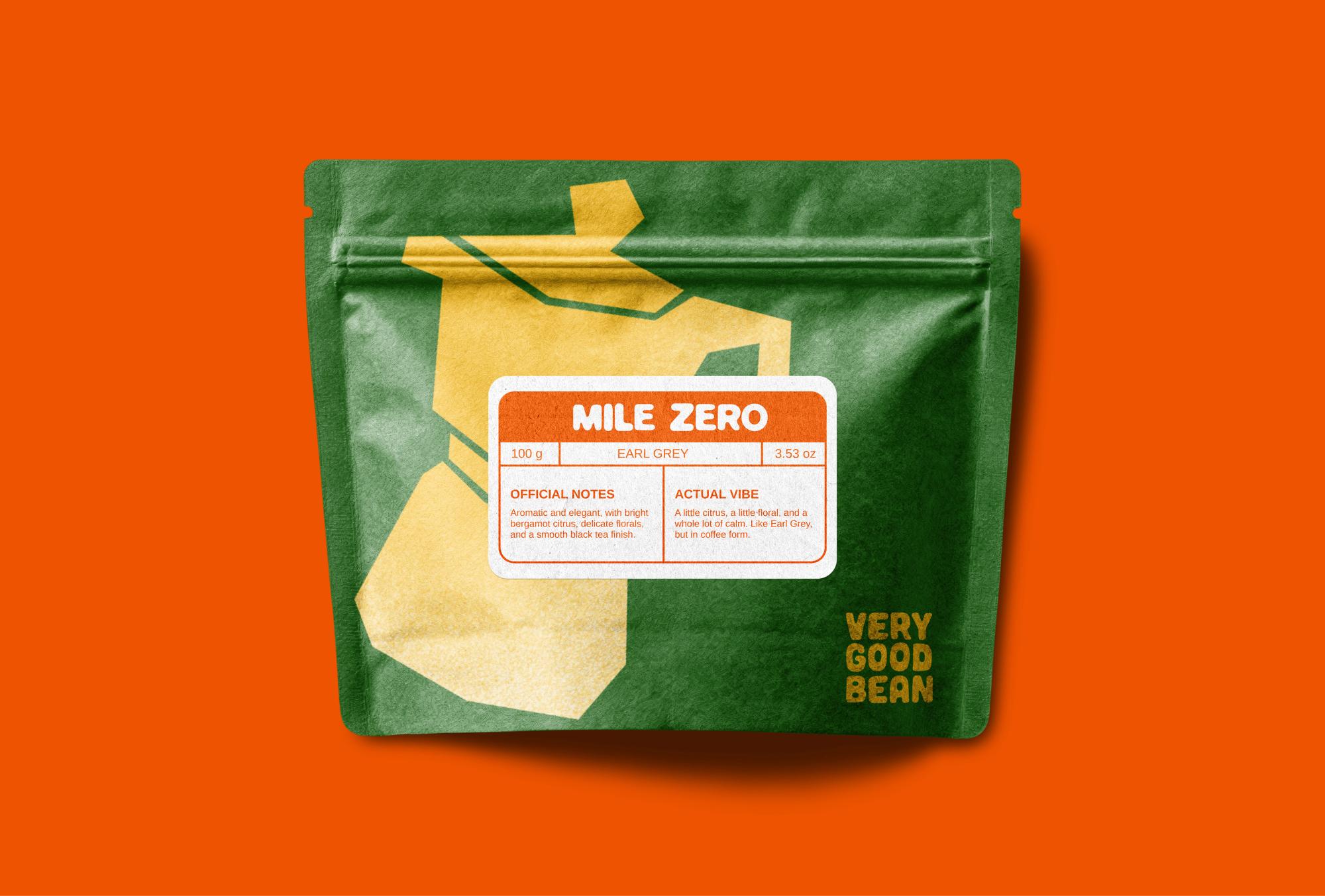 A green Mile Zero bag on orange, with a yellow cut-paper moka pot and a label listing official notes and actual vibe
