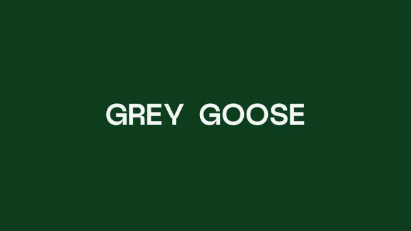 The Grey Goose wordmark in off-white on forest green