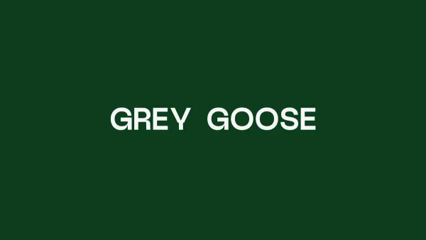The Grey Goose wordmark in off-white on forest green