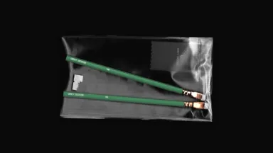 Two green Grey Goose HB pencils in a clear sleeve with a branded card