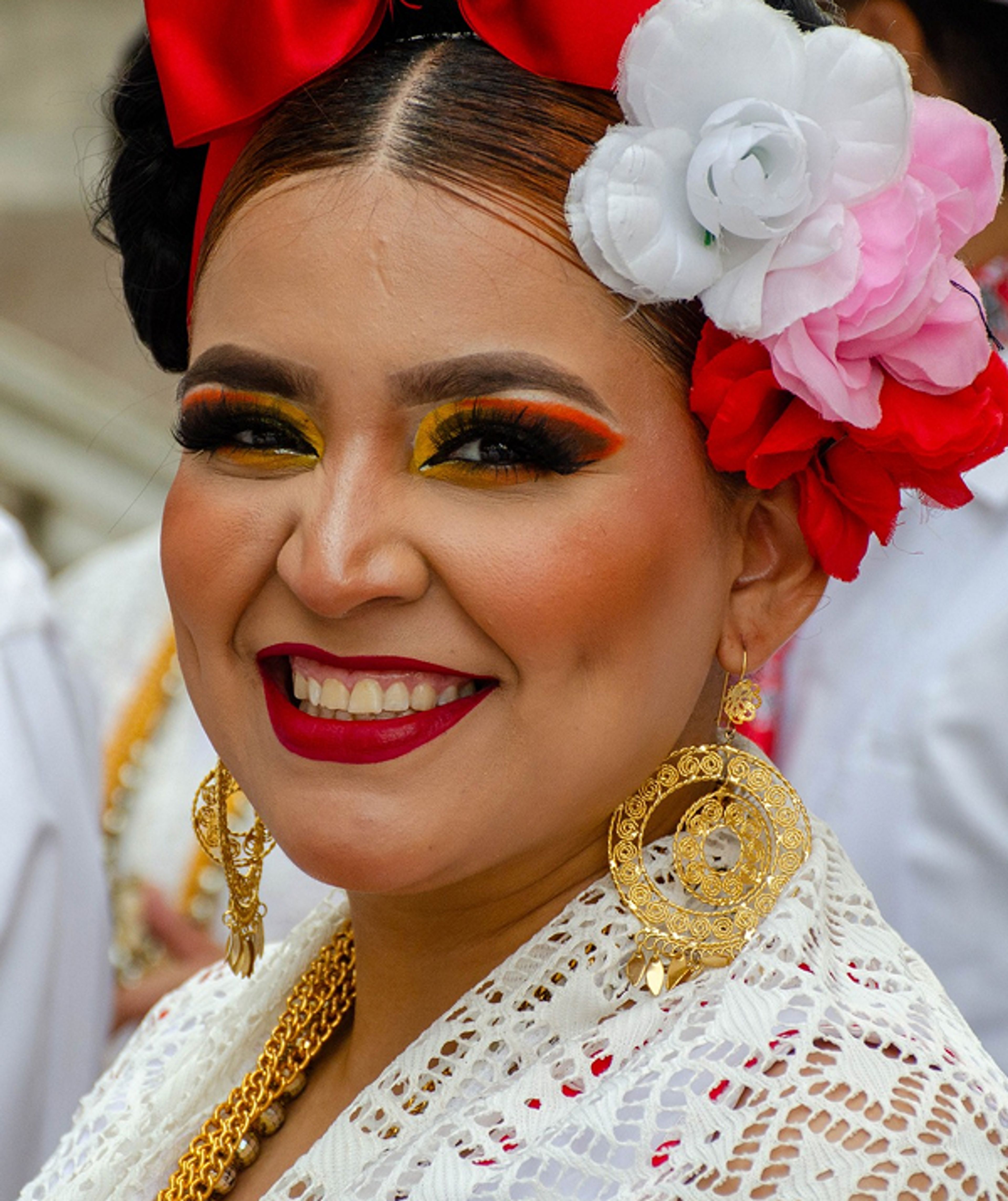 International groups in traditional costumes performing dances and music at the International Folklore Festival in Bergamo, bringing the city and surrounding towns to life with cultural celebrations.