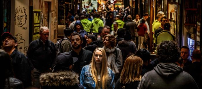 people walking down a crowded street