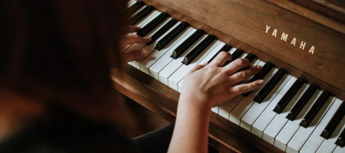 someone playing piano