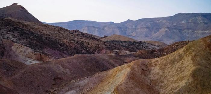 a view of a mountain range in the desert