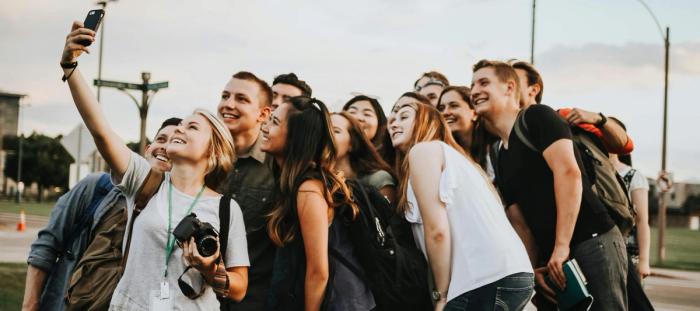 a group of people taking a picture together