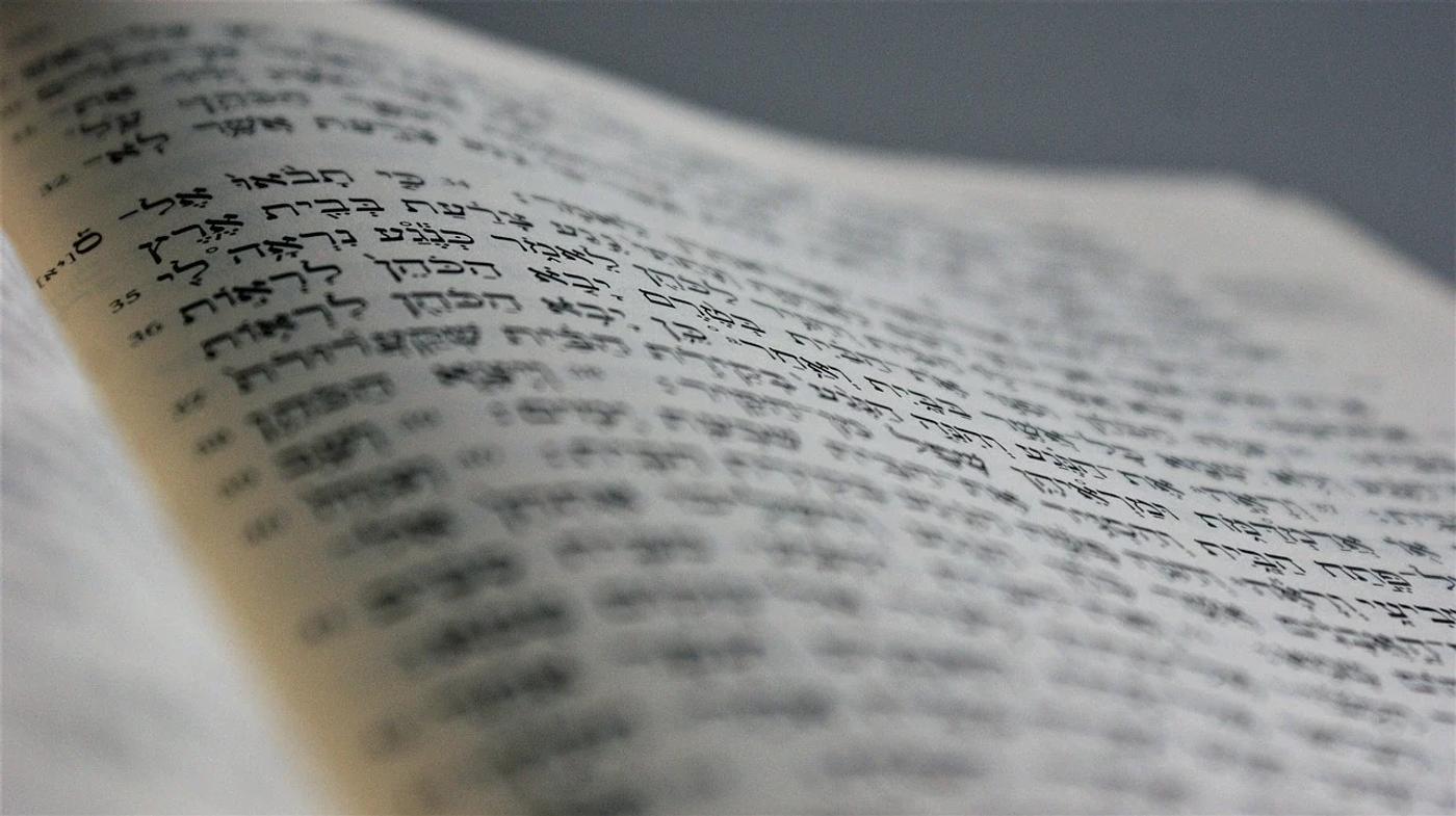 An open Bible in its original language