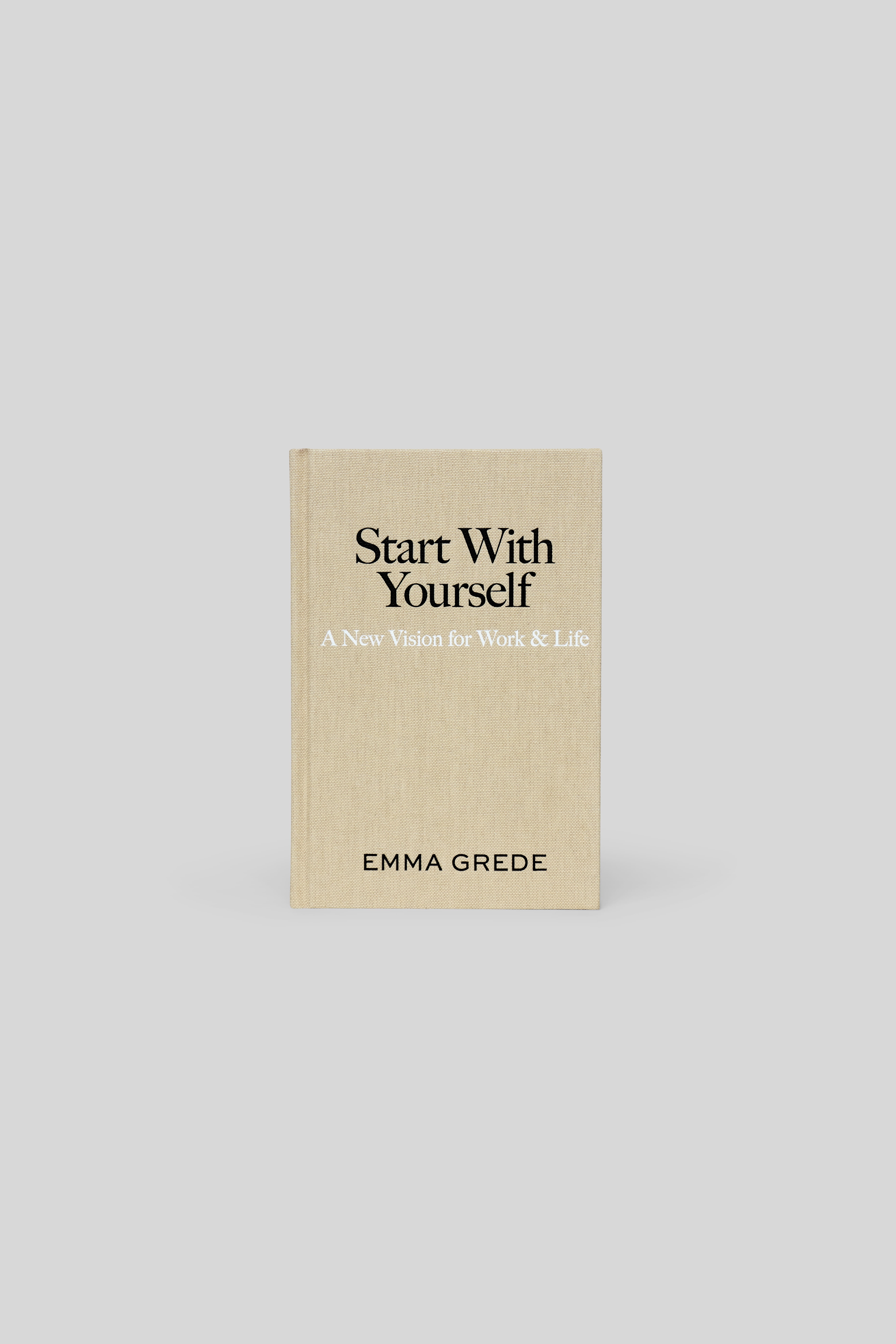 Light beige book titled "Start With Yourself" by Emma Grede.
