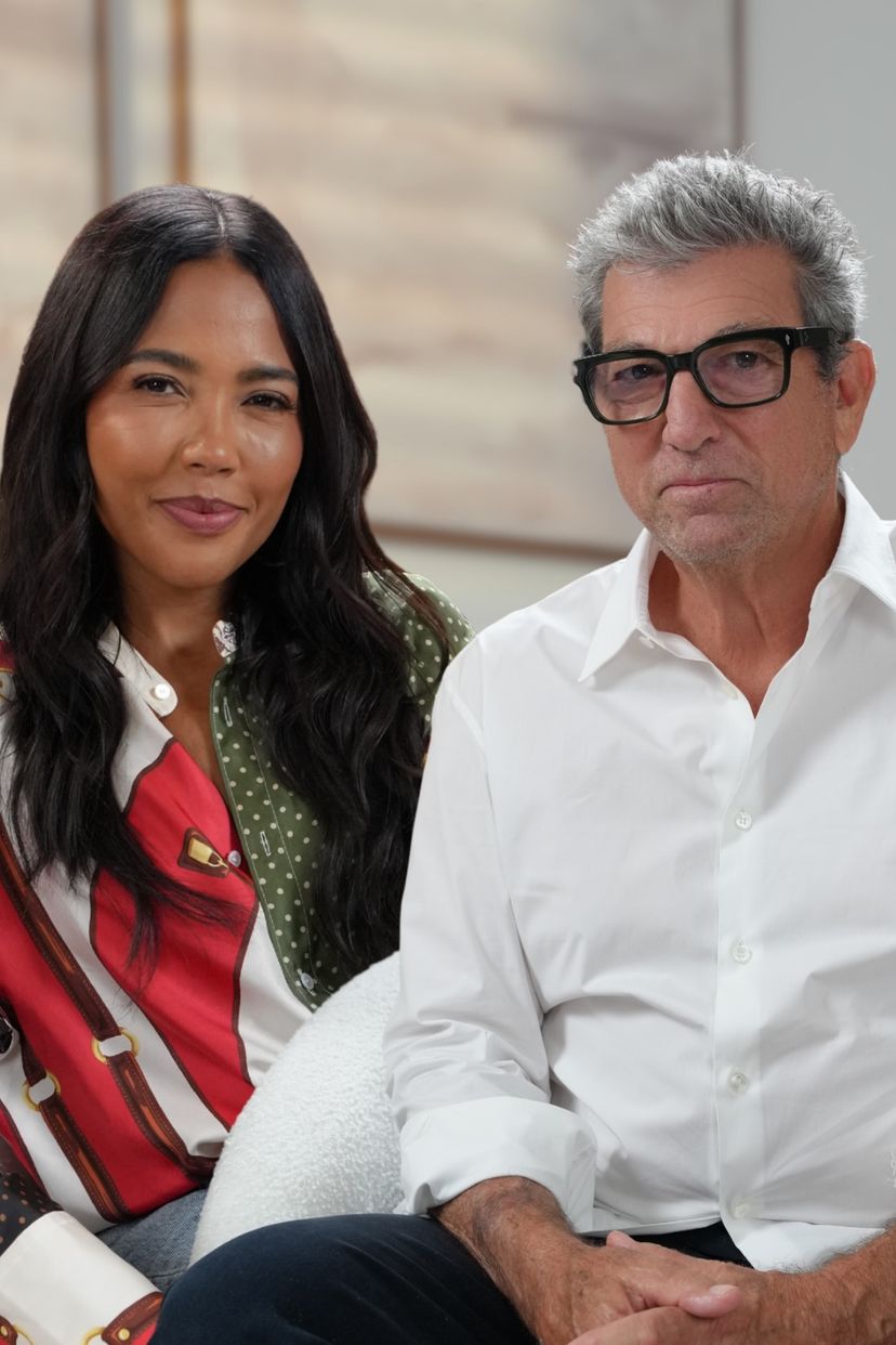 A smiling woman and a serious man in glasses sit under the text "HOW GREAT BRANDS ARE BUILT w/ Andrew Rosen".