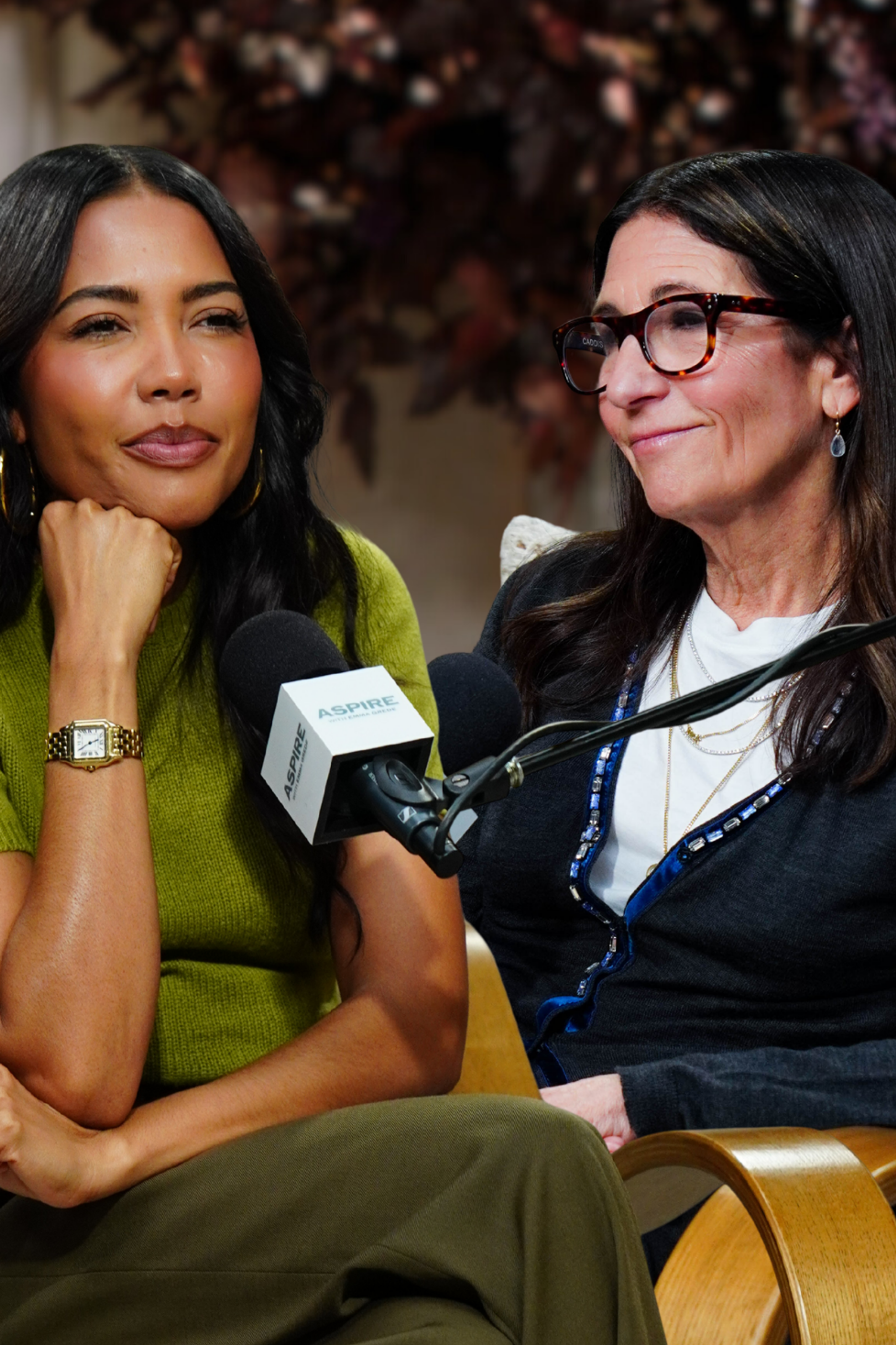 Emma Grede and Bobbi Brown seated, engaged in conversation with microphones.