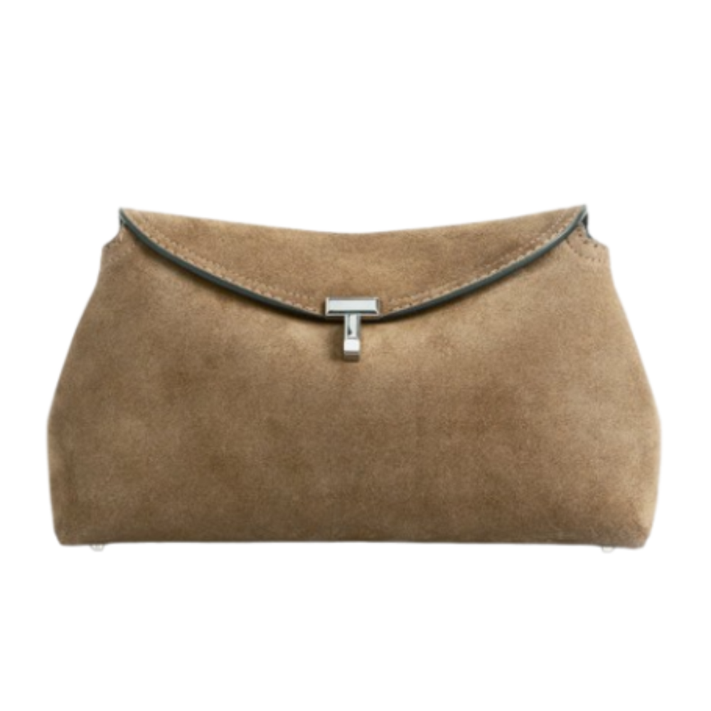 Toteme T-lock suede clutch in tobacco brown featuring a curved silhouette and signature metallic T-lock hardware.