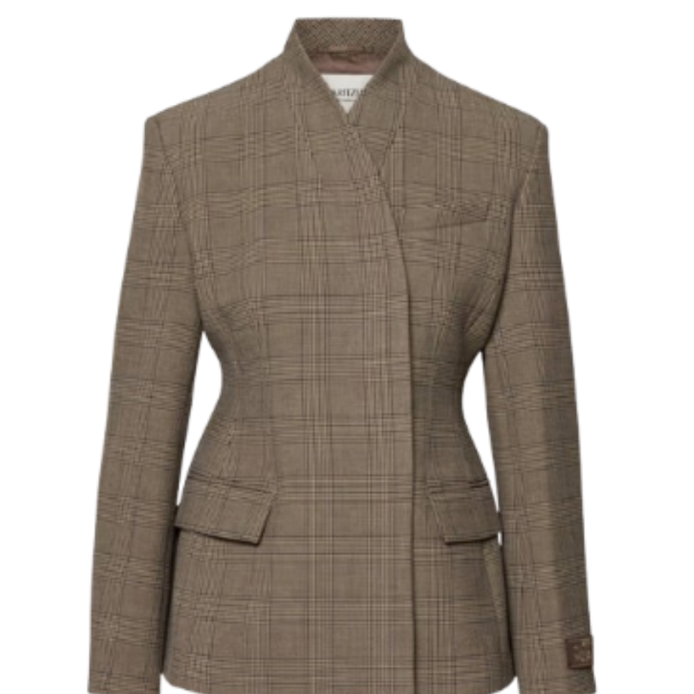 Aritzia brown plaid long-sleeve tailored blazer featuring an asymmetrical wrap front, stand collar, flap pockets, and a sculptural cinched waist.