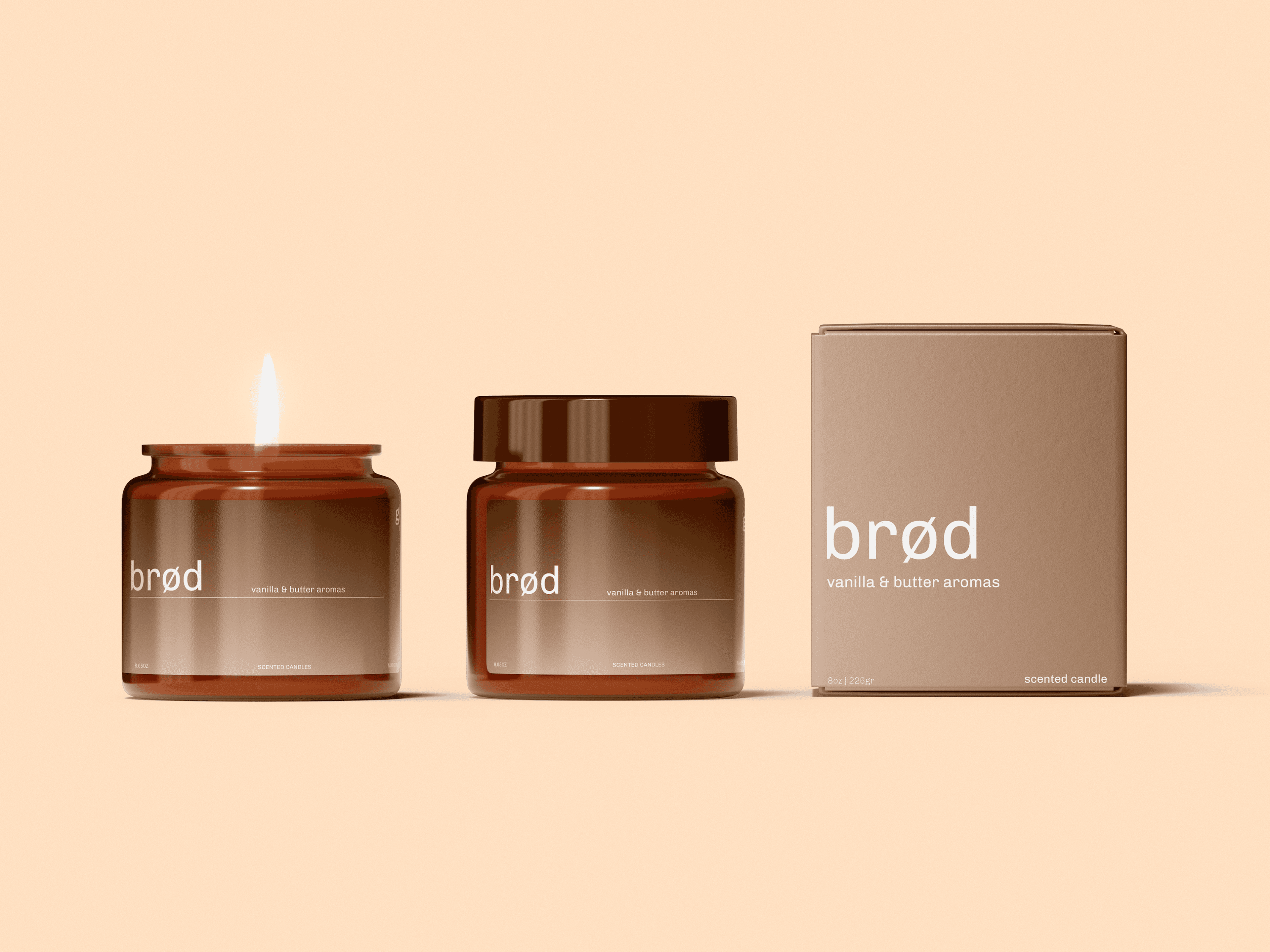 Two amber glass candles and a matching box labeled brød vanilla butter aromas shown as minimal packaging design.