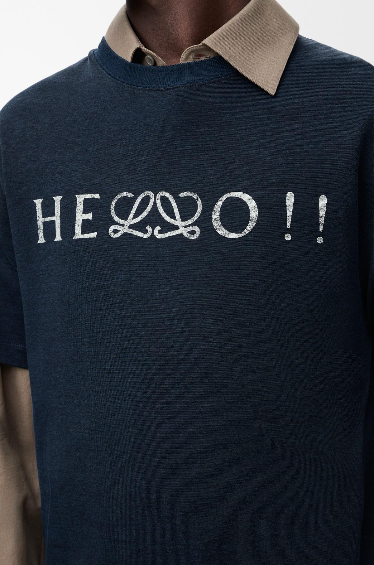 Loewe new logo integrated into apparel design, demonstrating the refined anagram used as a graphic element