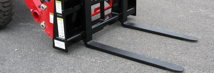Pallet forks for subcompact tractors