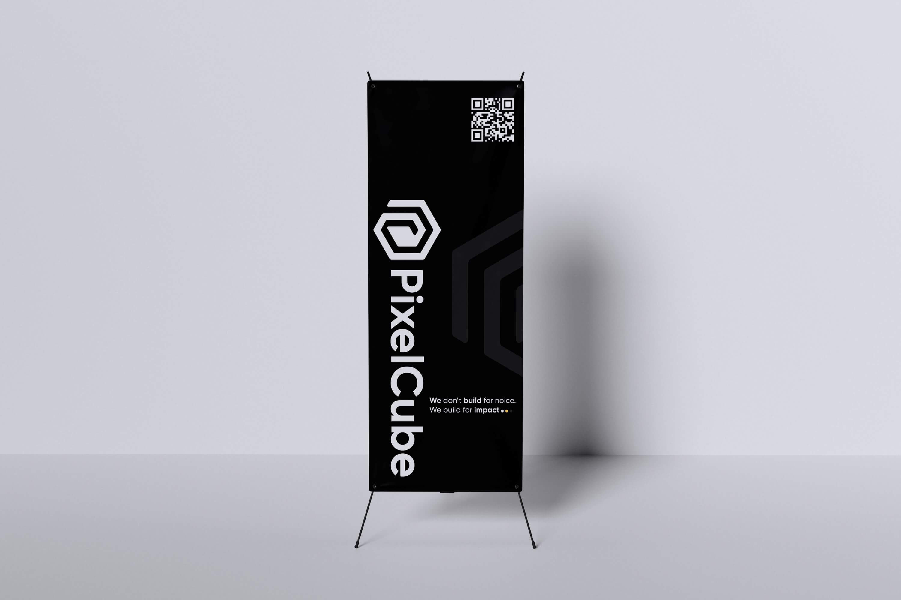 Modern PixelCube corporate X-banner featuring a minimalist black design with vertical logo placement and QR code.