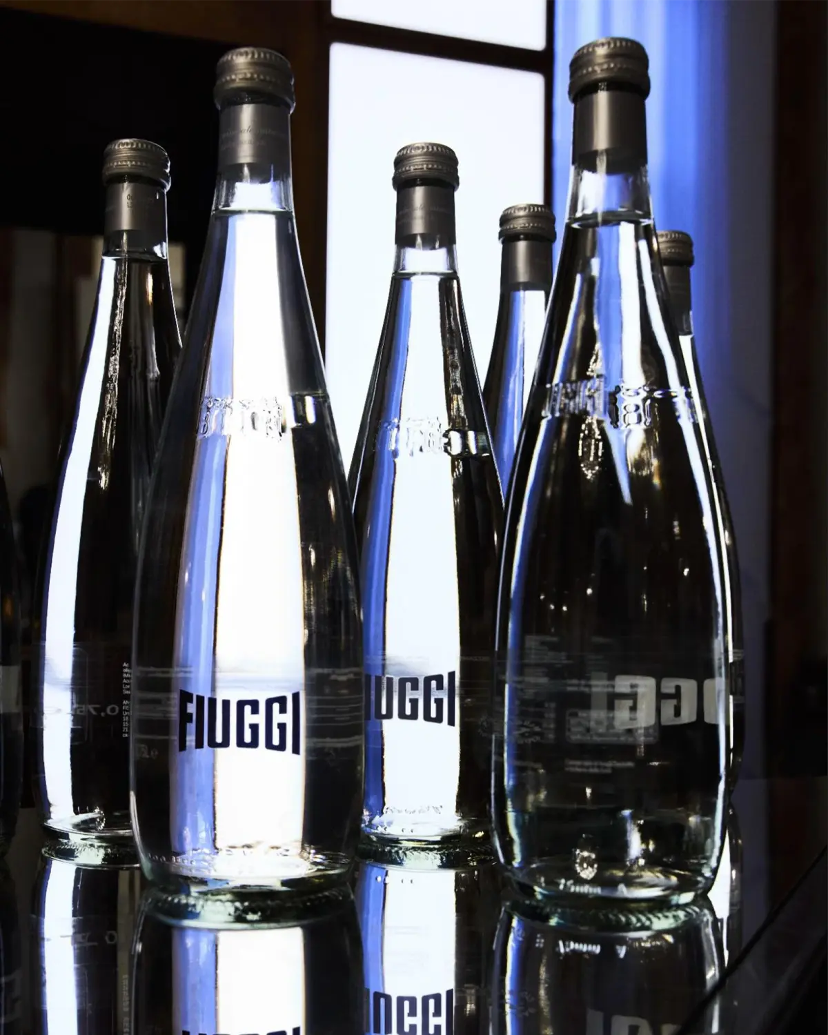 Bottiglie Acqua Fiuggi nella mise en place dell'evento Alta Moda di Dolce e Gabbana