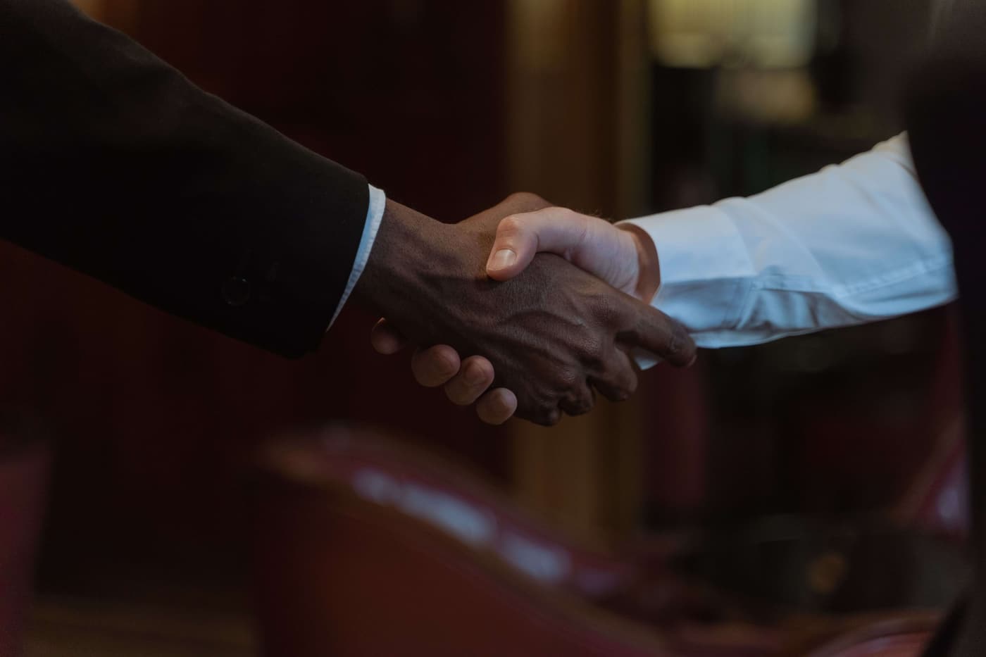 Two professionals shaking hands
