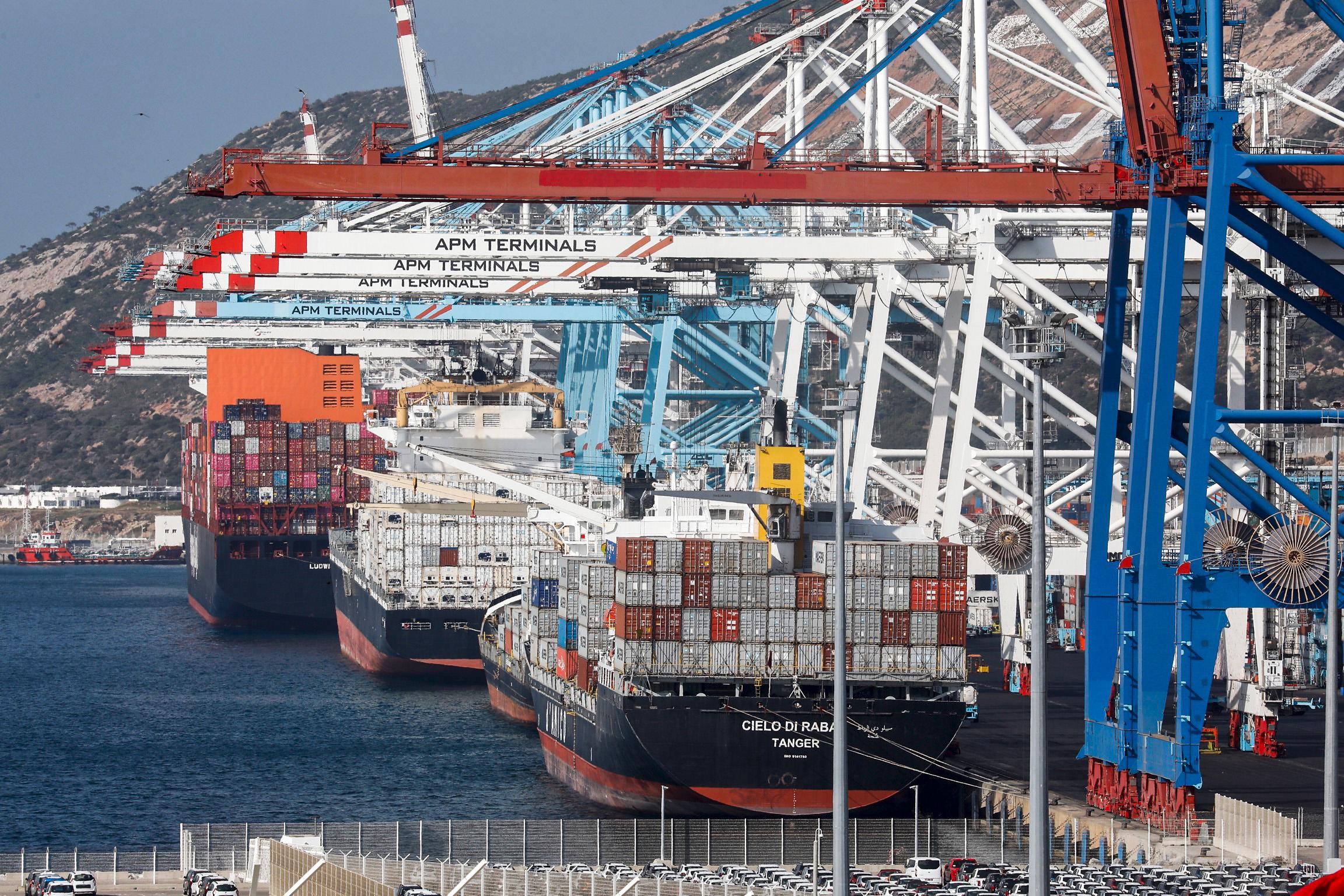 Container ship and container terminal at Tanger Med illustrating the international freight movement included in landed cost.