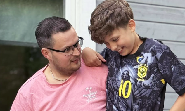 a boy wearing a shirt with the number 10 on it