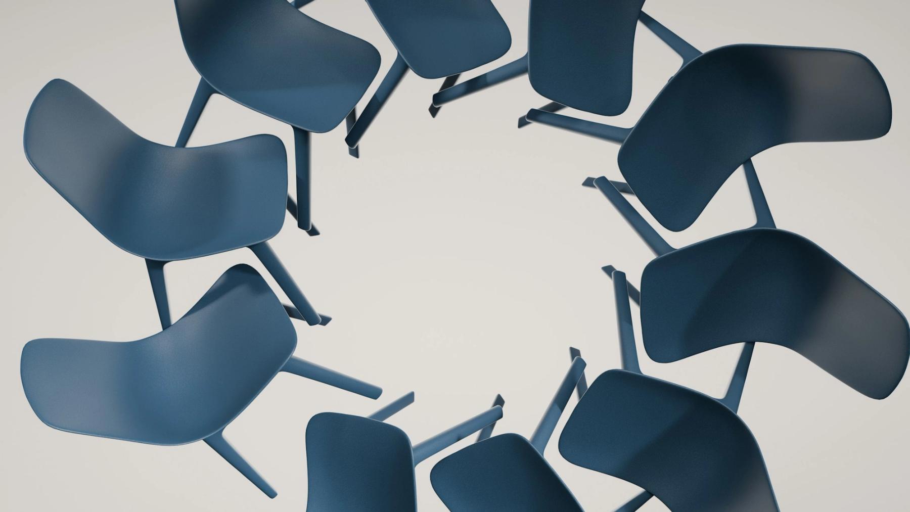 Chairs arranged in a circle for a group meeting.