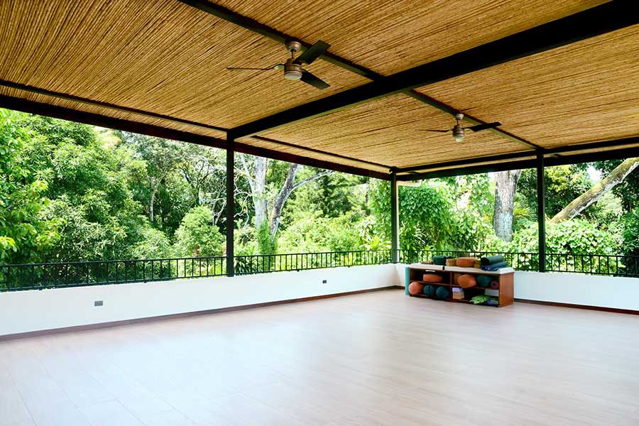 Open-air yoga deck overlooking the river valley.
