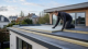 Professional flat roof insulation installation on a UK home extension with insulation boards and waterproof roof detailing.