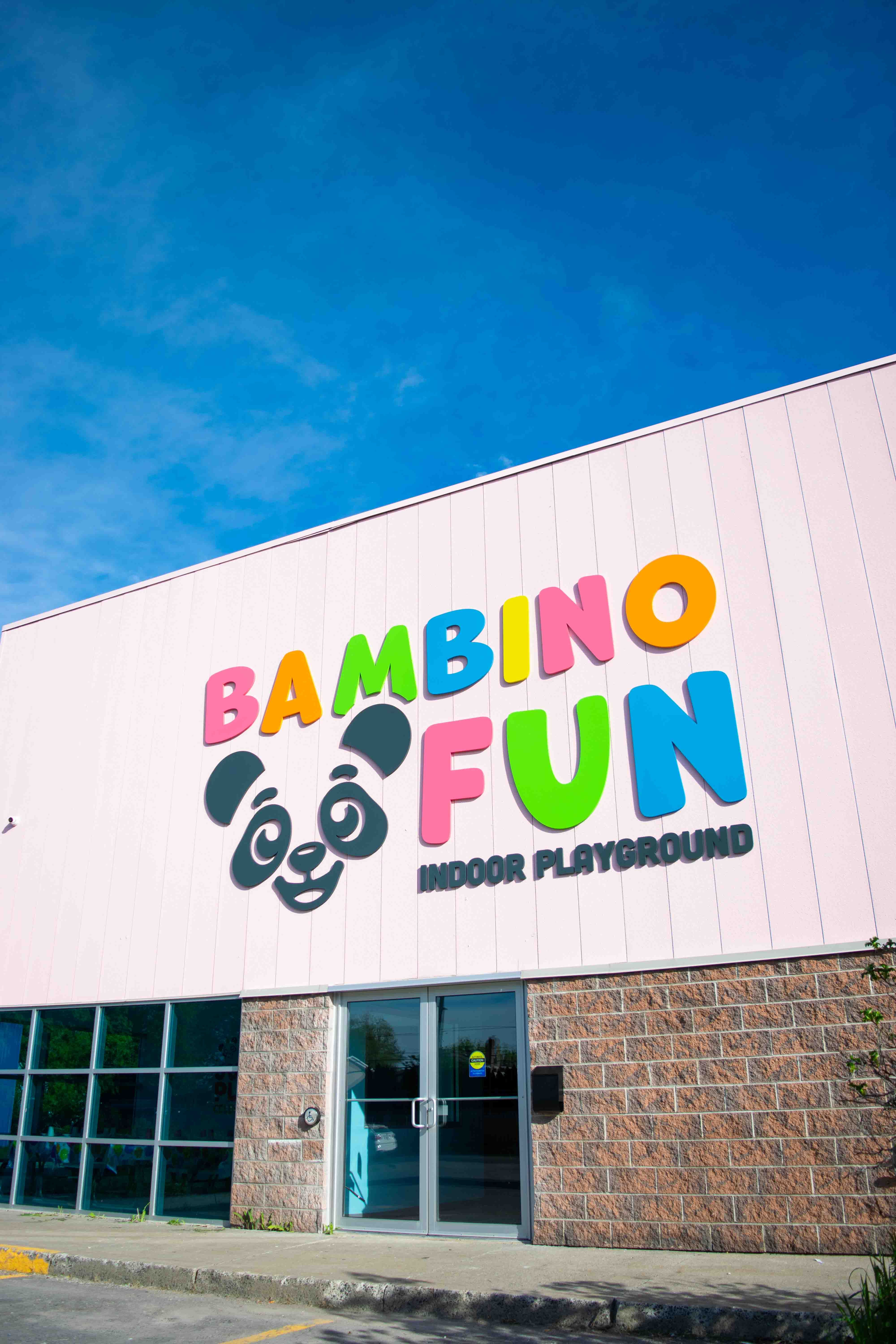 Front exterior entrance of Bambino Fun with large sign above doorway