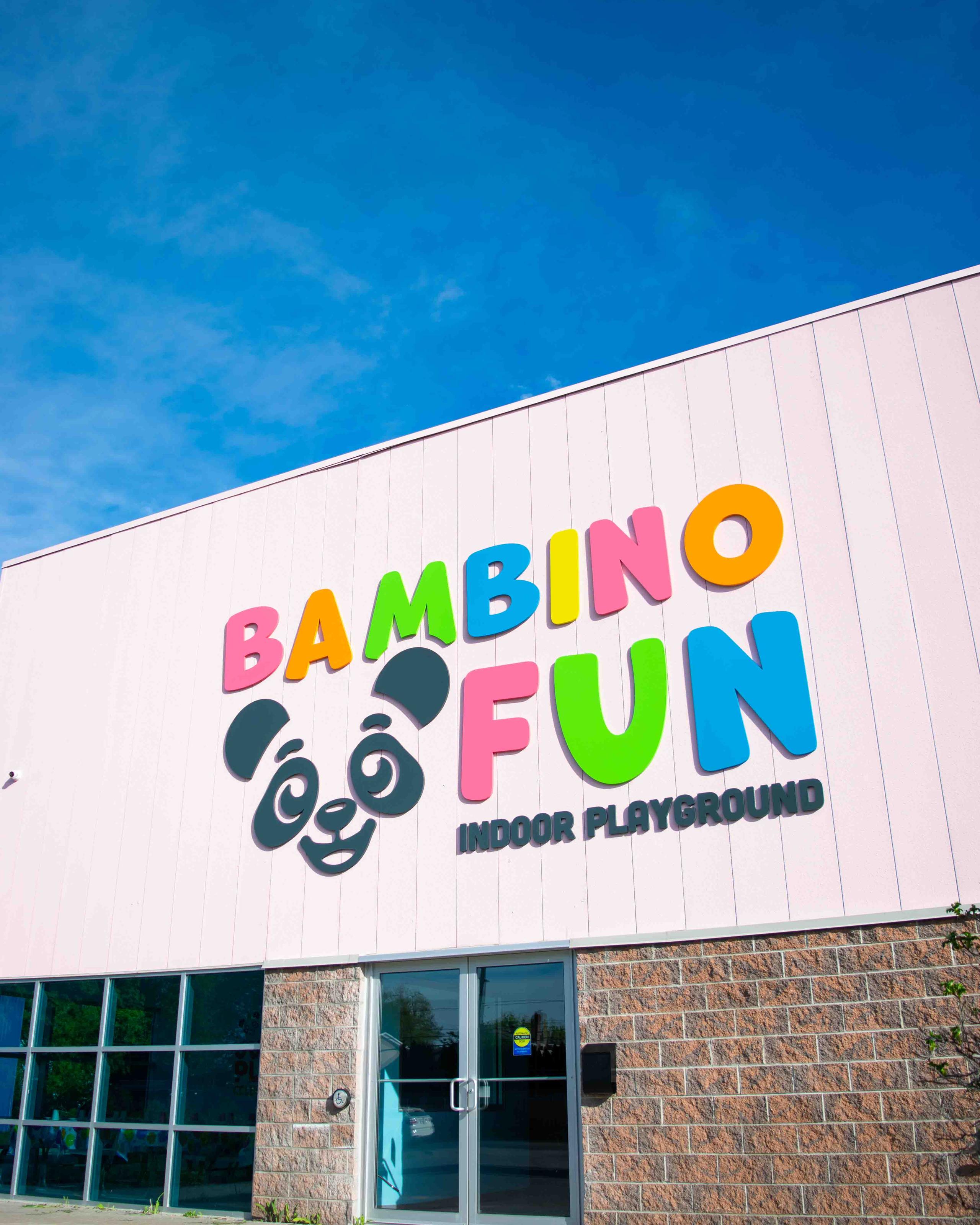 Front exterior entrance of Bambino Fun with large sign above doorway