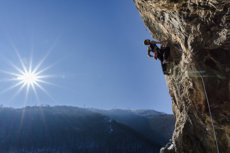 man-climbing-mountain
