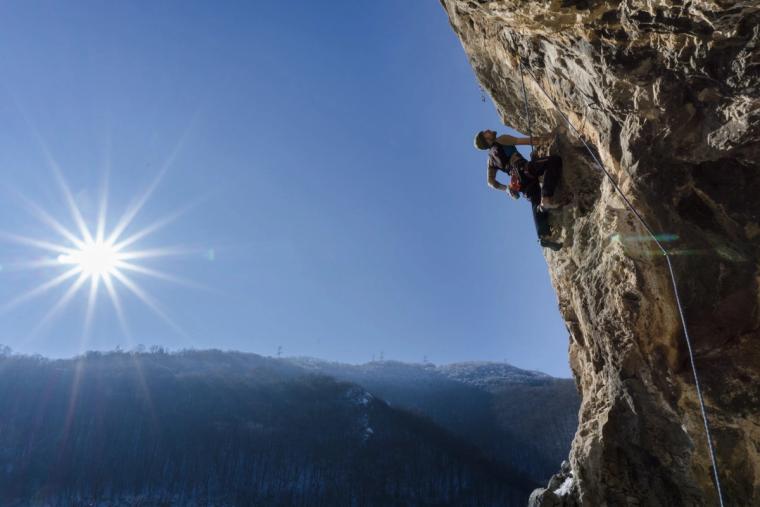 man-climbing-mountain