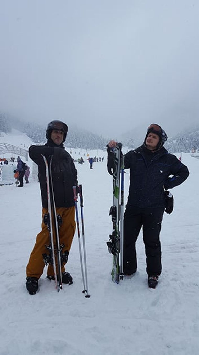 two-men-snowboarding