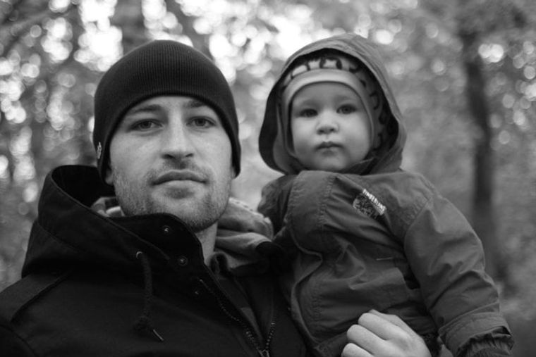 black-white-photo-man-with-baby
