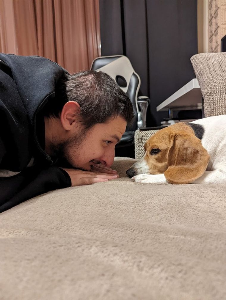 man-and-little-dog-sitting