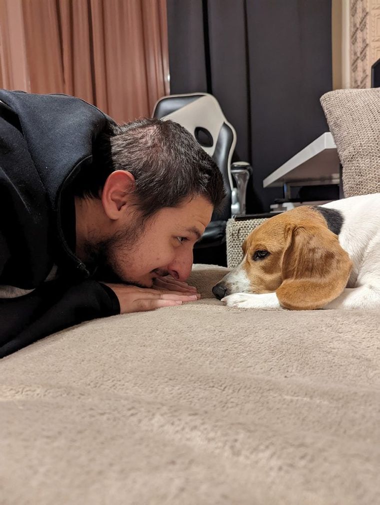 man-and-little-dog-sitting