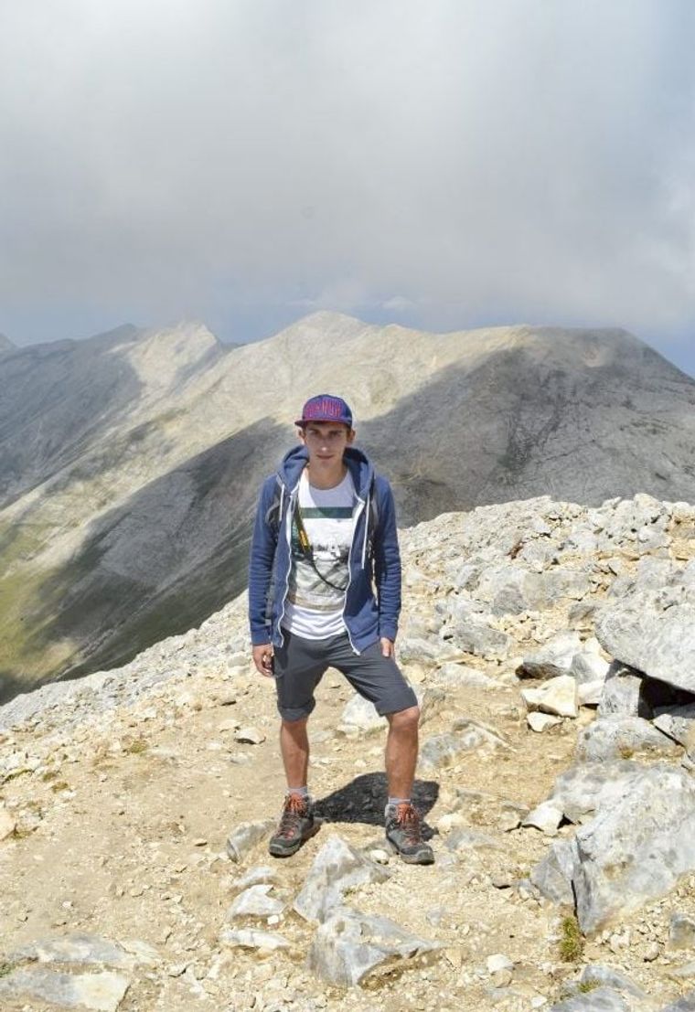 A man climbing a mountain
