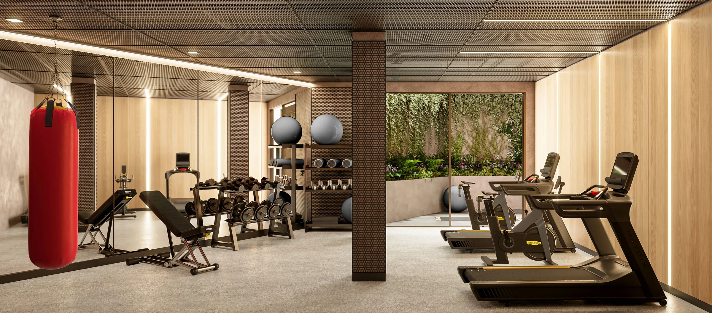 Gimnasio equipado con vista al patio ajardinado
