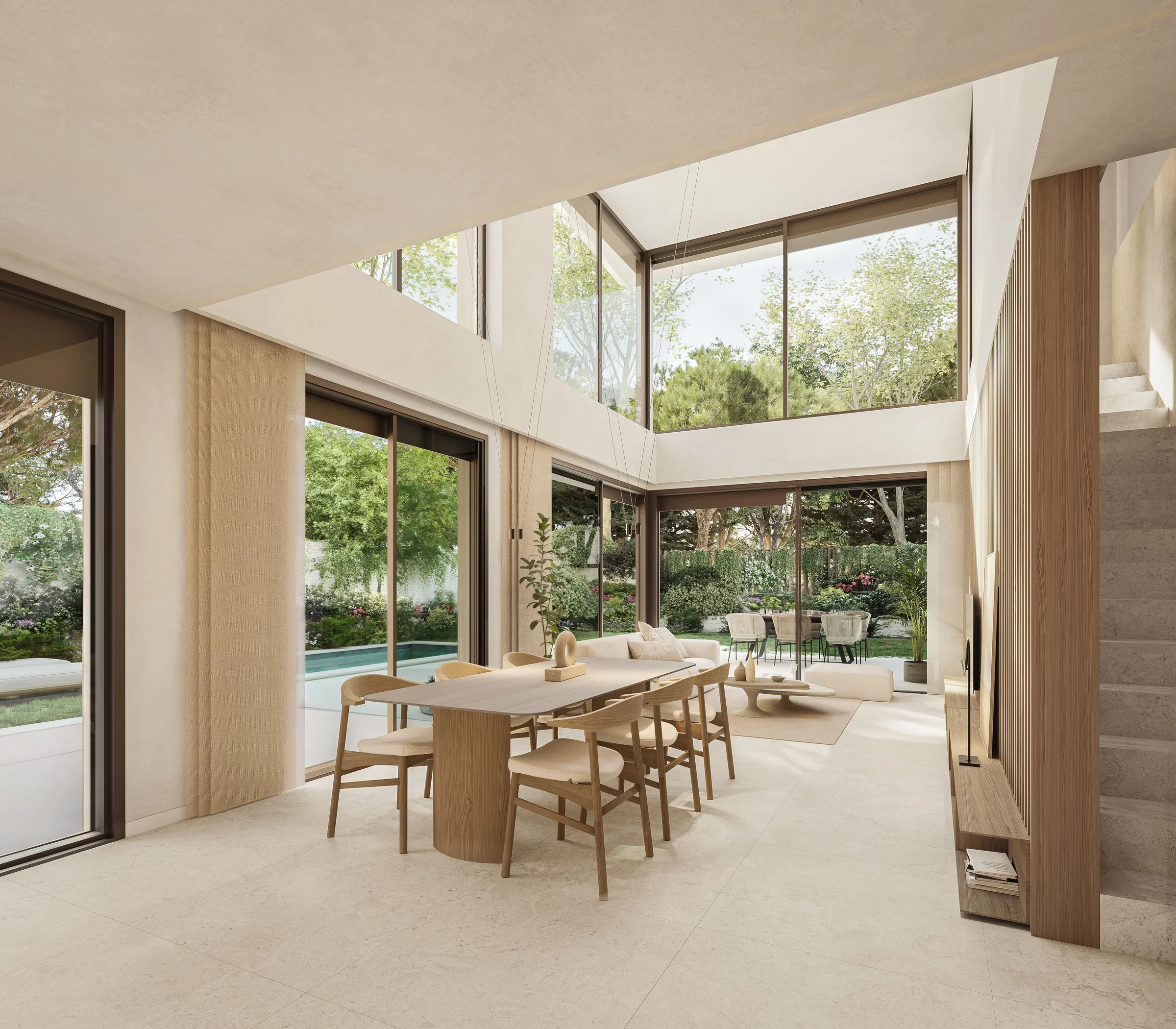 Salón abierto al jardín con piscina
