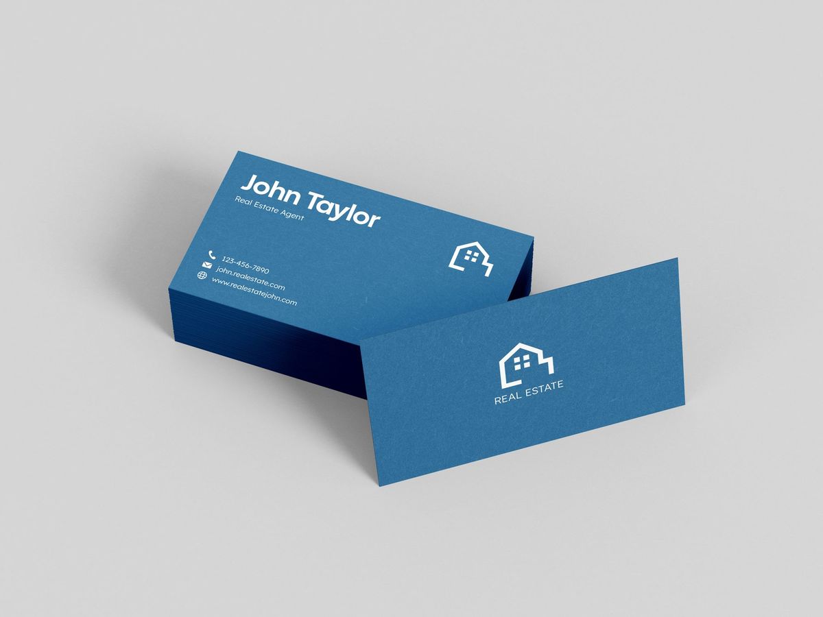 Premium navy business cards with white foil logo, front and back