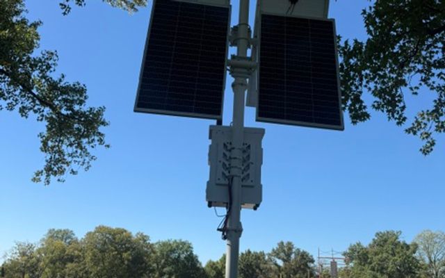 Solar-powered security camera towers