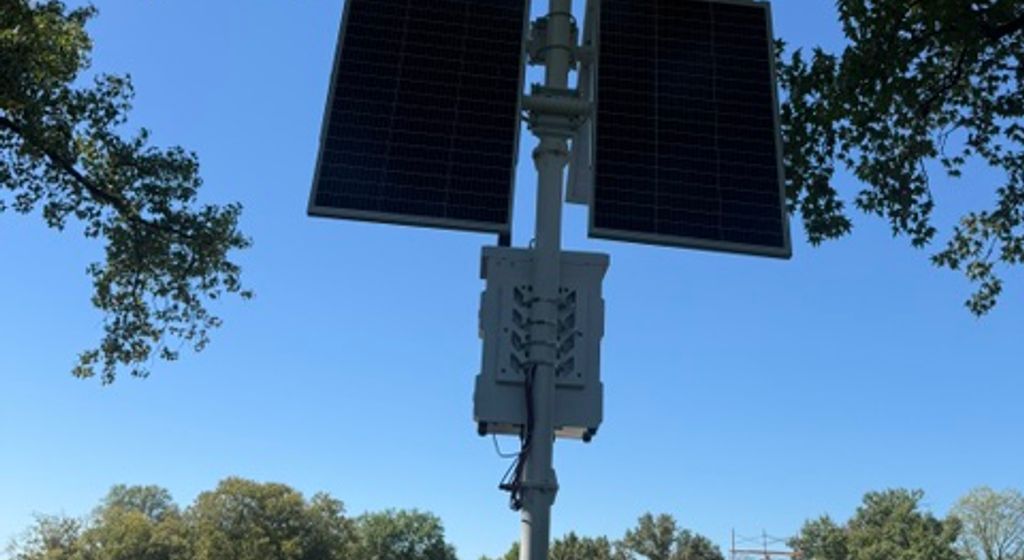 Solar-powered security camera towers