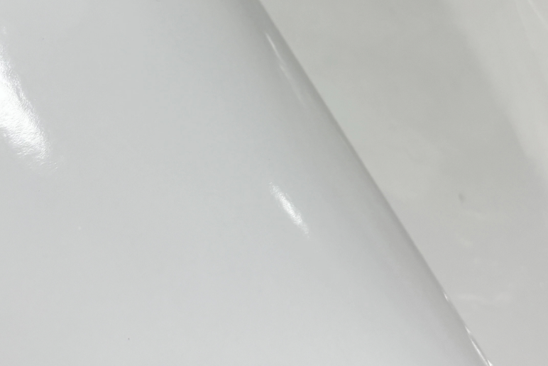 Biodegradable paper-based sticker on packaging