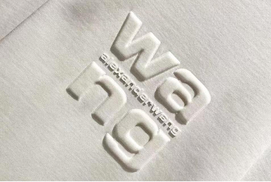 Raised 3D logo application on white fabric for branded dust bags and packaging pouches