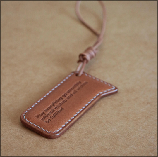 Leather tag on handbag