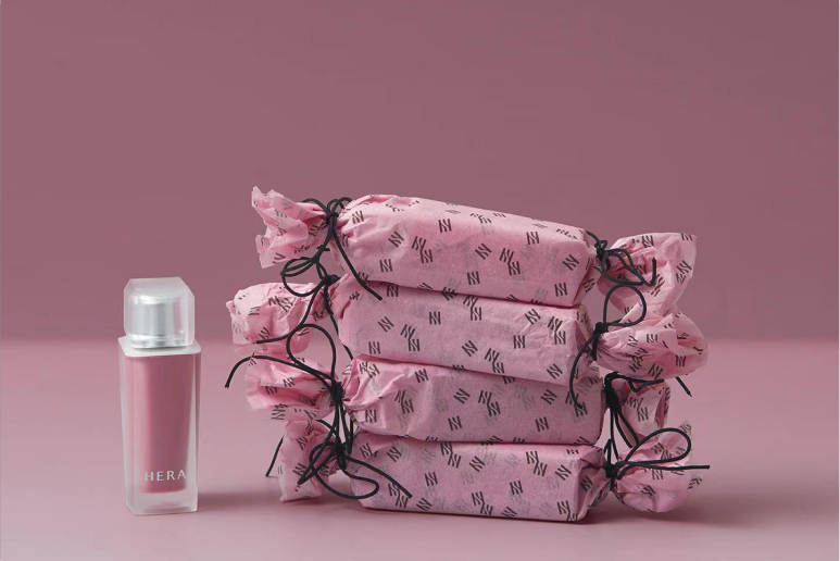 Products wrapped in floral tissue paper pouches