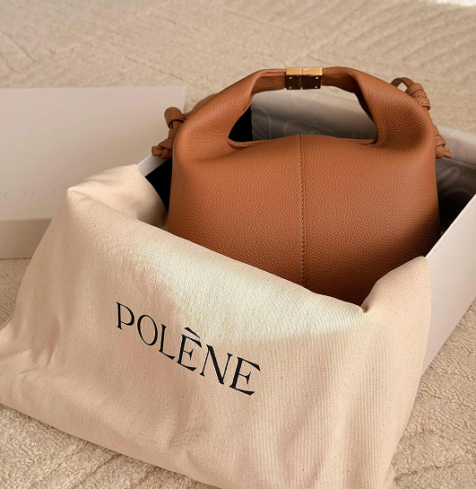 Polène leather handbag inside branded packaging for custom tissue paper case study