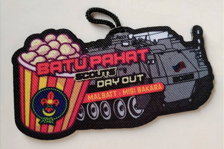 Shaped logo patch sample with woven texture